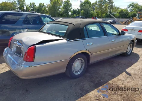2001 Lincoln Town Car Executive из США, поврежденный, VIN 1LNHM81W71Y709953